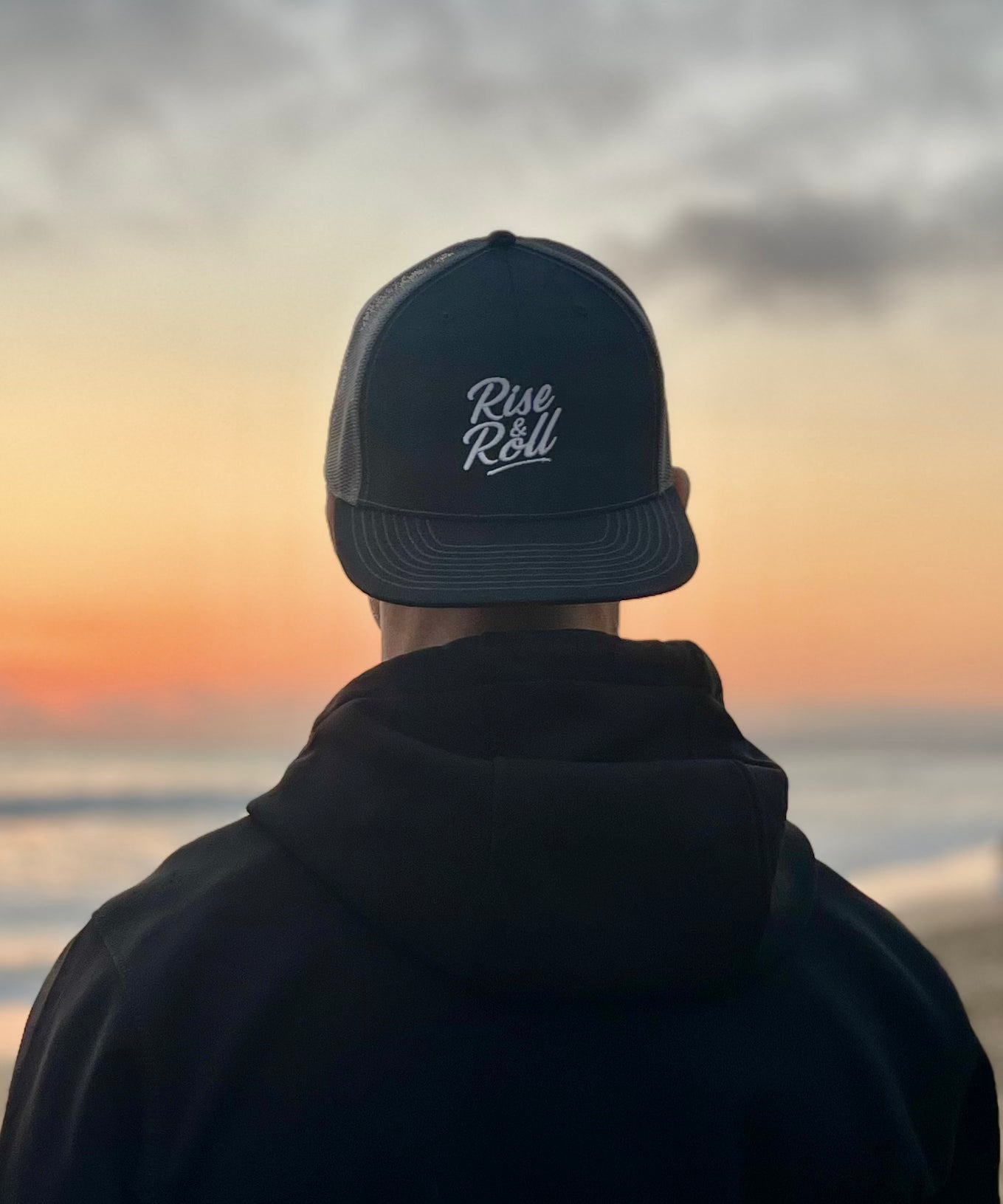 Cursive Logo Trucker Cap